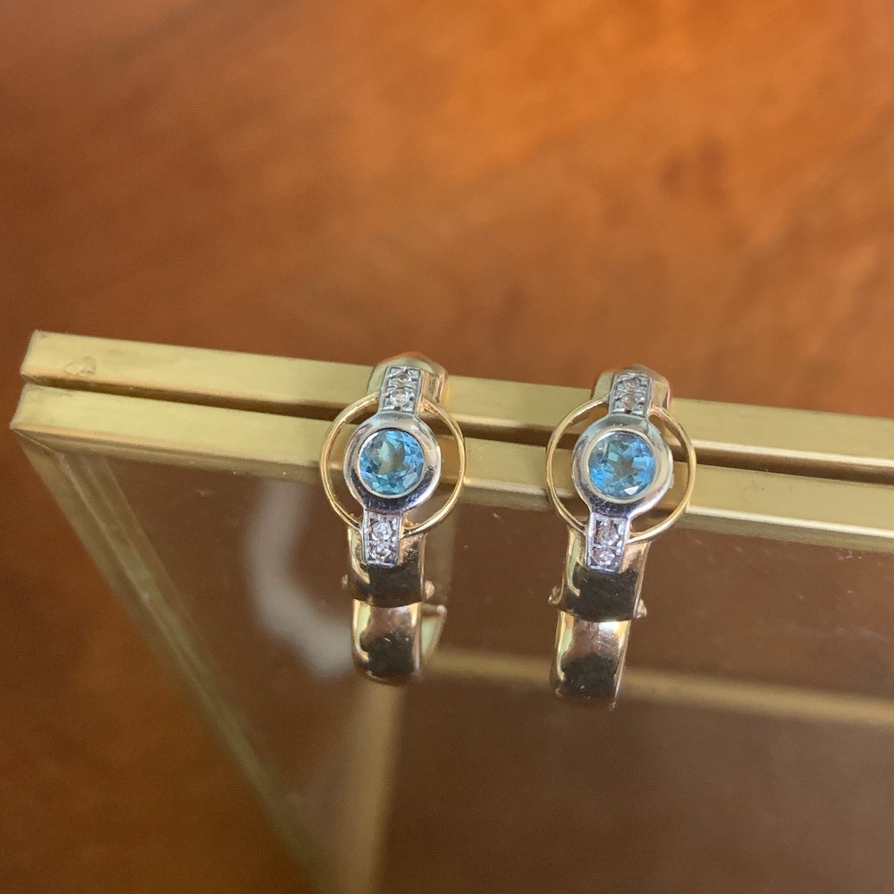 Gold earrings with blue topaz and small diamonds